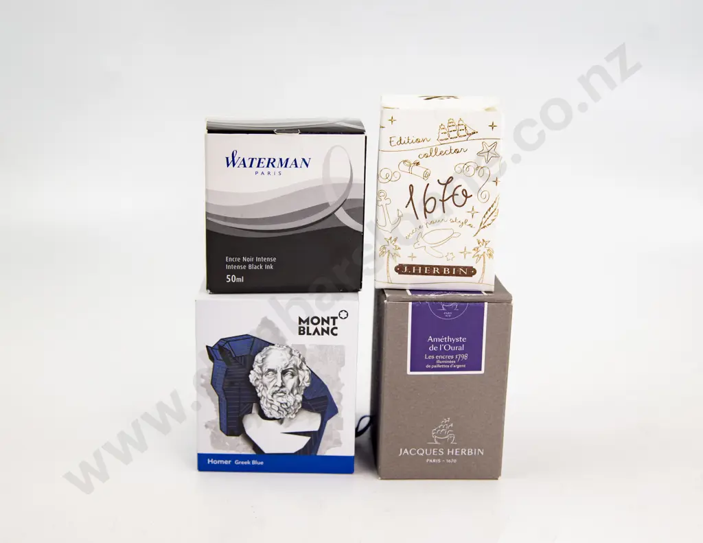 Four Various Bottles of Ink and Desk Pad Image 1++