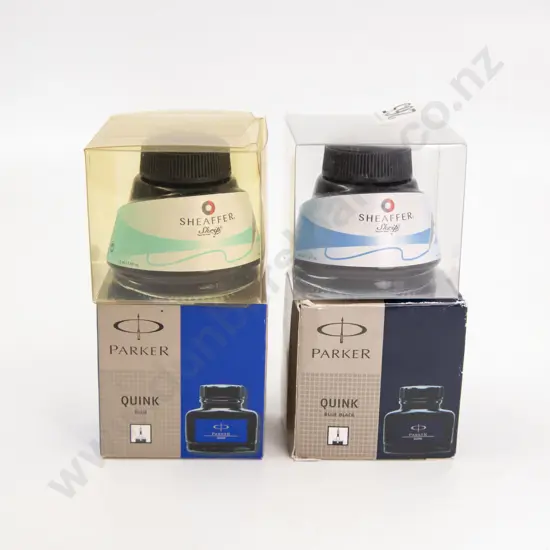 Four Various Bottles of Ink and Desk Pad
