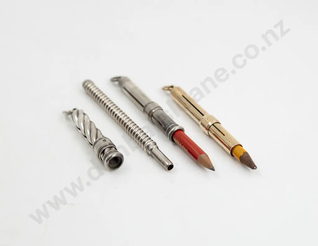 Four Victorian S. Mordan & Co Pencil Holders Image 1++