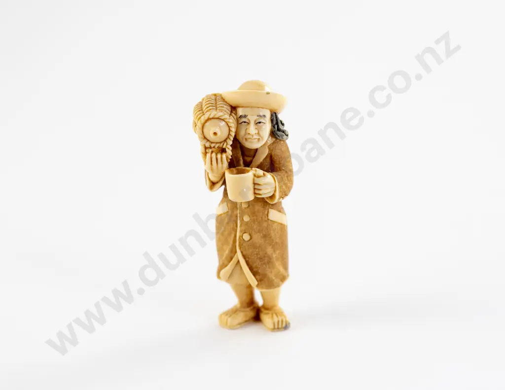 Signed and Stained Ivory Netsuke of a Standing Foreigner Image 1++