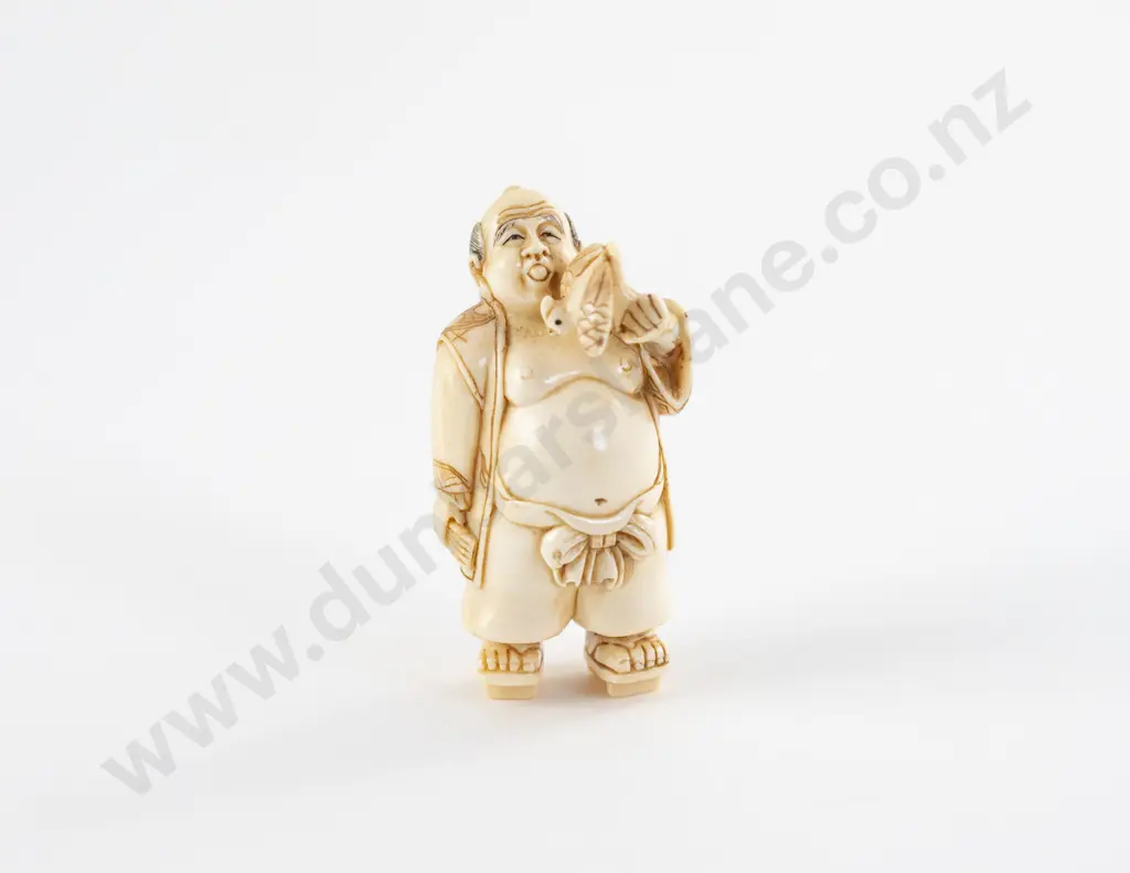 Signed Ivory Netsuke of an Immortal Holding a Bird Image 1++