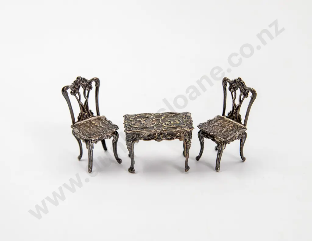 QEII S/S Miniature Ornately Embossed Table and Two Chairs Image 1++