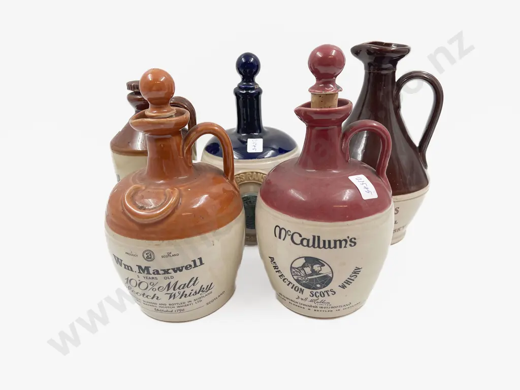 Four Assorted Stoneware Whisky Jugs & Other Image 1++