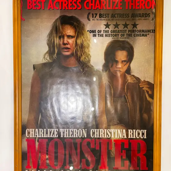 Four Assorted Framed Posters