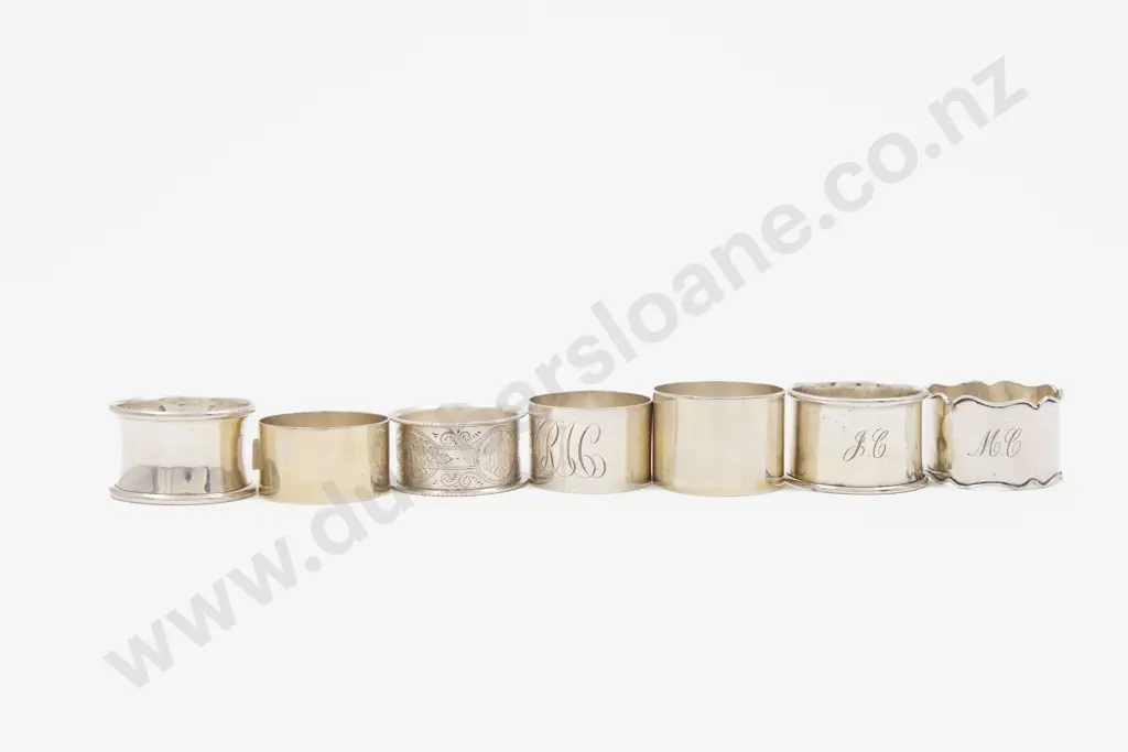 7 Various S/S Napkin Rings Including 2 NZ Examples Image 1++