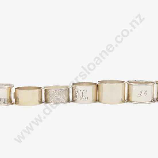 7 Various S/S Napkin Rings Including 2 NZ Examples