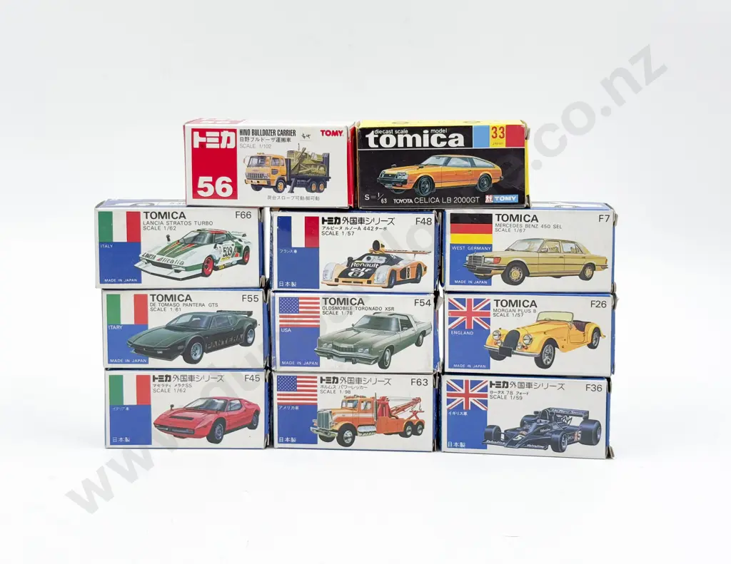 Tomica Japan Ten Boxed Models and Tomy Hino Bulldozer Carrier Image 1++
