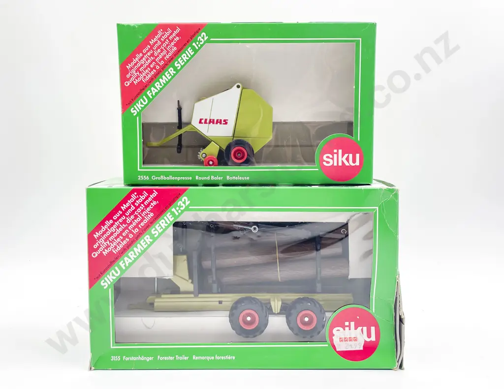 Boxed Siku Farmer Series 1:32 2556 Round Baler and 3155 Forester Trailer Image 1++