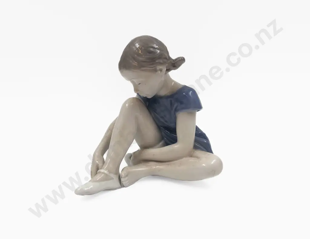 Royal Copenhagen Figure of Girl Putting on Ballet Flats Image 1++