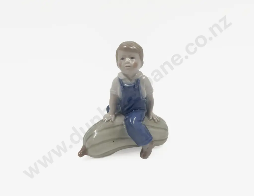 Royal Copenhagen Figure of Boy Astride Oversized Melon Image 1++