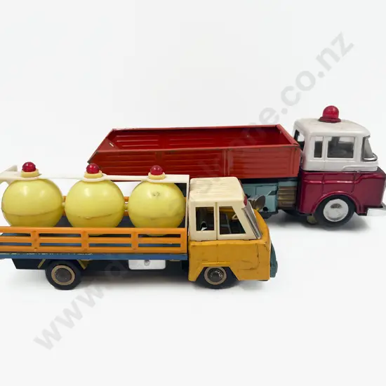 Two Made in China Battery & Friction Tin Plate Trucks