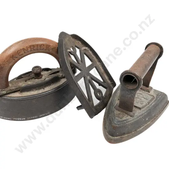 Two Vintage Flat Irons with Trivet
