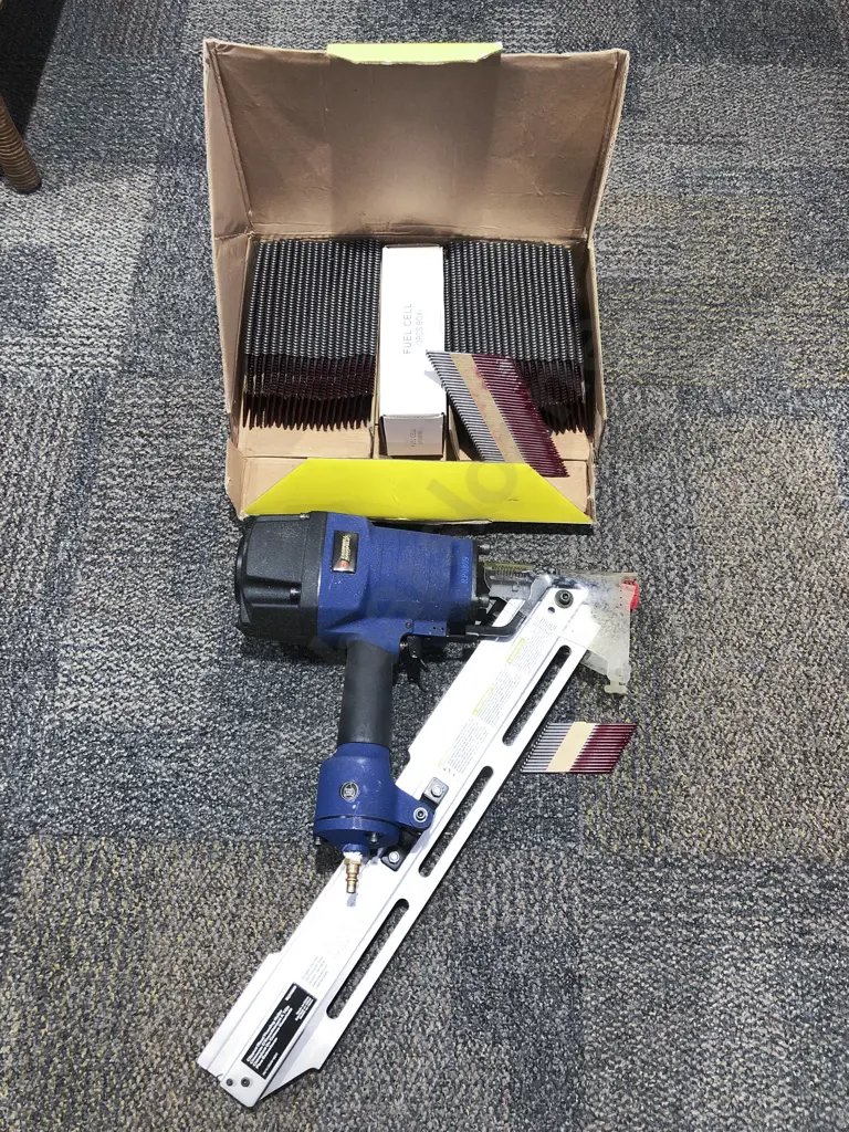 Campbell Hausfeld Nail Gun together with Box of Assorted Nails Image 1++