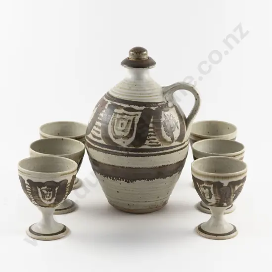 Probable Eatelle Martin Earthenware Flagon and Six Goblets