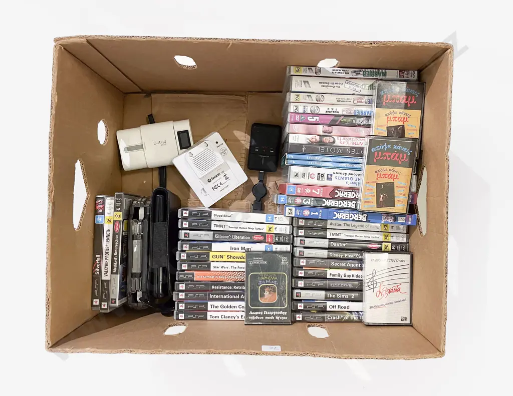 PSP together with Assorted Games DVDs etc Image 1++
