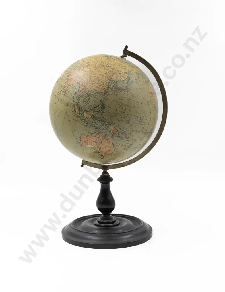Philips 9 Inch Terrestrial Globe with arched gilt brass holding arm on ebonised stand Image 1++