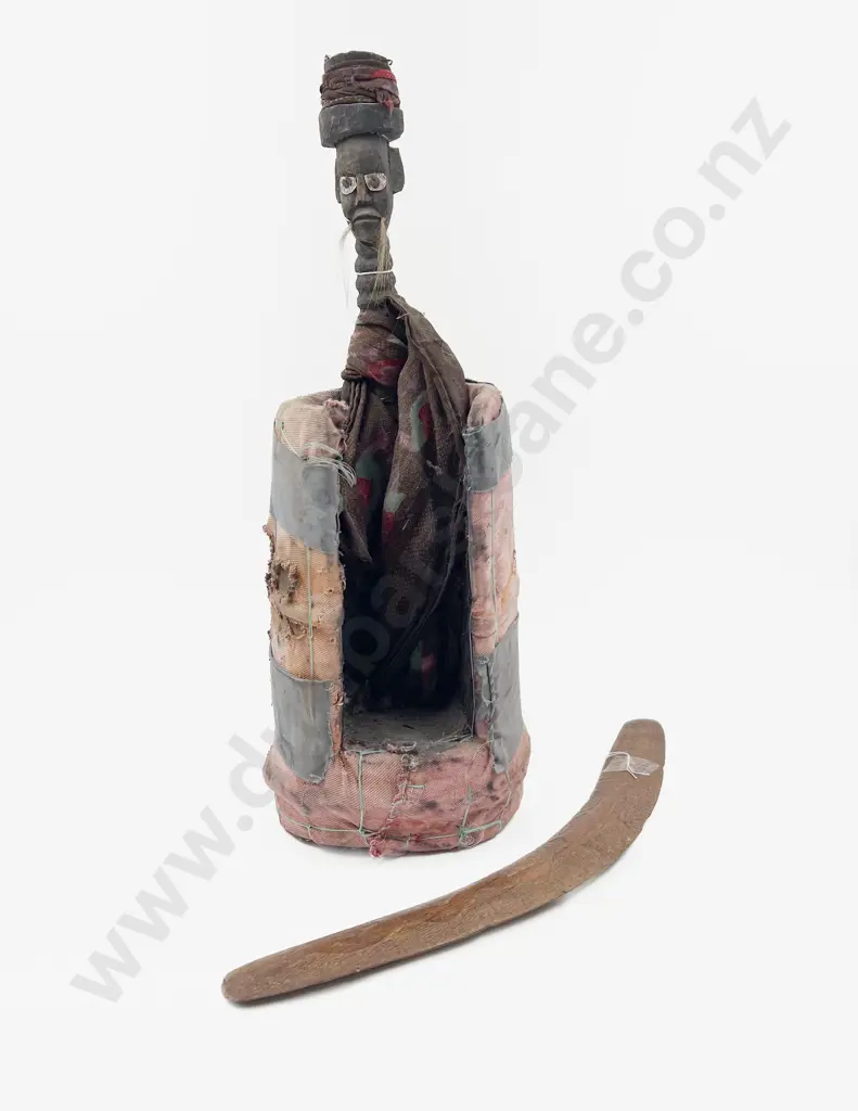 Solomons or East Timor Figure together with Boomerang Image 1++
