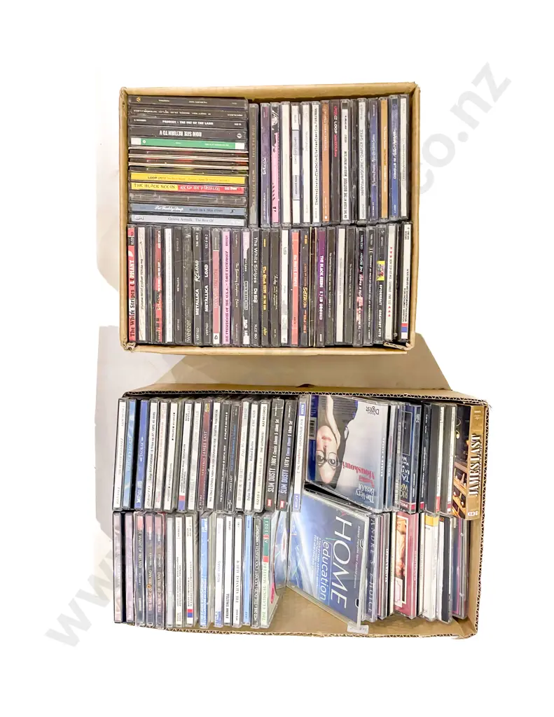 Four Boxes of Assorted CDs and DVDs Image 1++