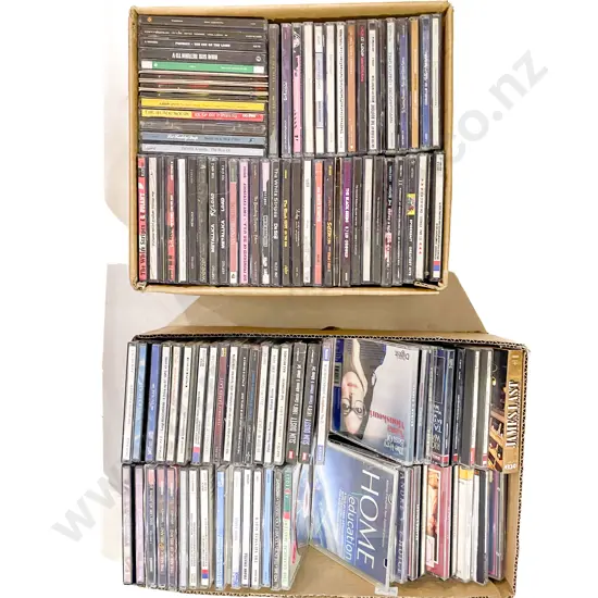 Four Boxes of Assorted CDs and DVDs
