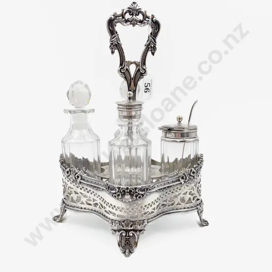Vict S/P 4 Bottle Cruet Stand of quatrefoil outline with fixed scroll handle