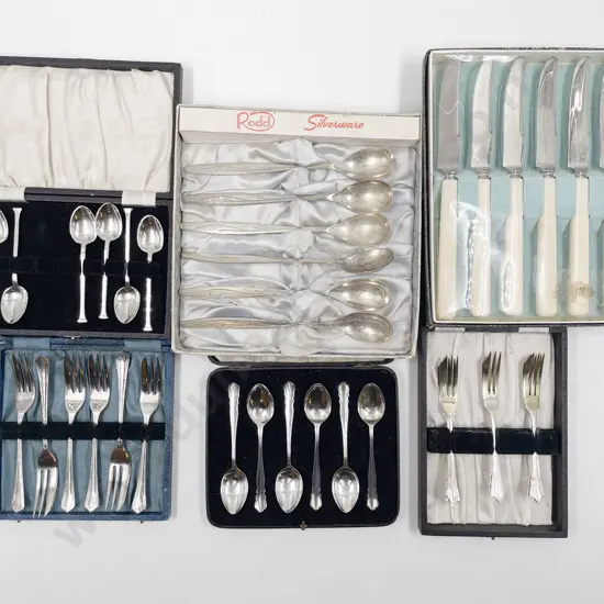 Six Assorted Boxed Cutlery On Circular Plated Tray