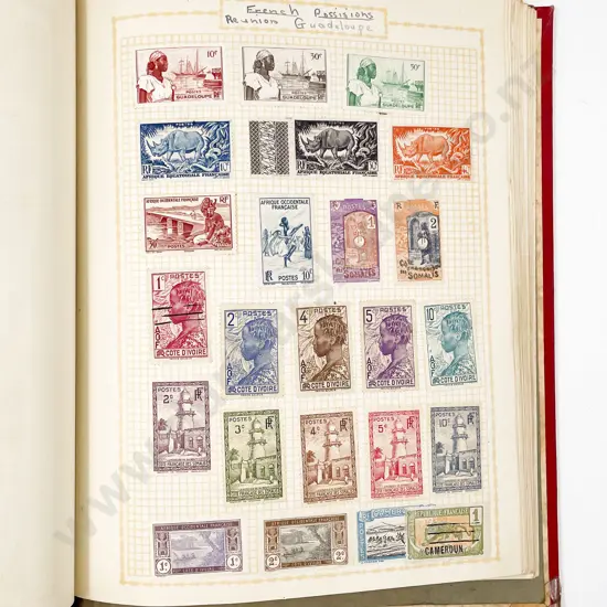 Two Vintage School Boy World Stamp Albums with some loose (one album few stamps)