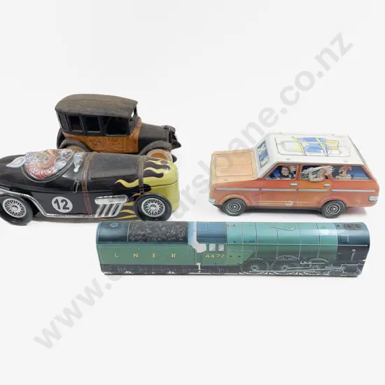 Reproduction Cast Iron Vintage Yellow Cab Model and three novelty vehicle tins