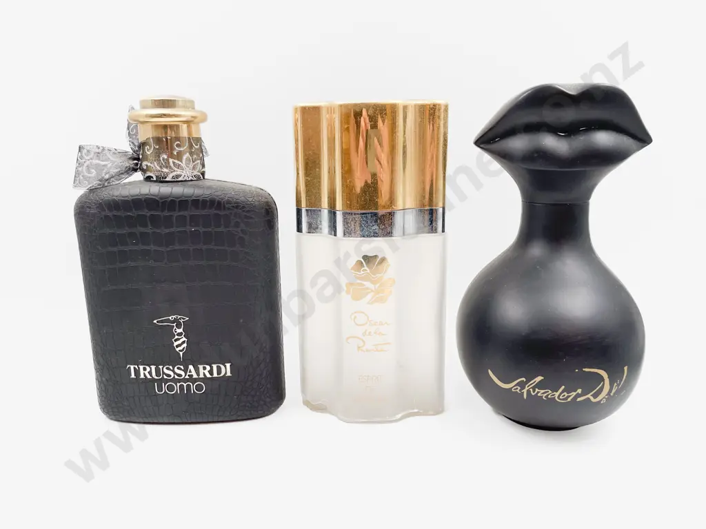 Three Perfume Display Bottles Image 1++