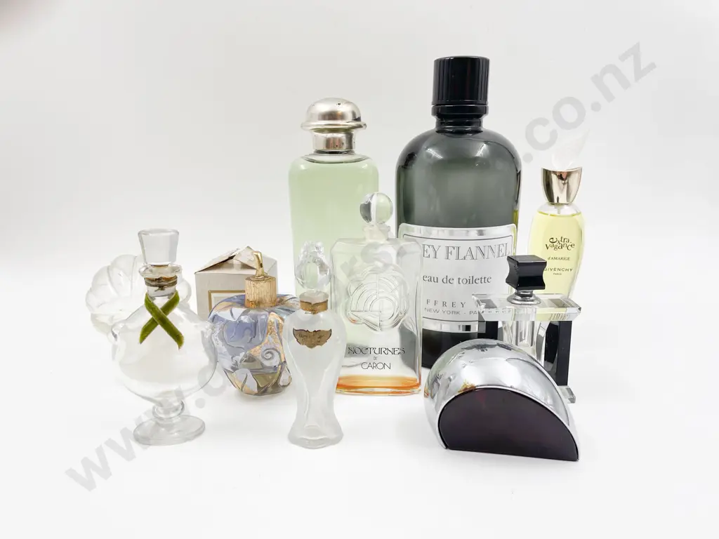 Quantity of Assorted Perfume Bottles Image 1++