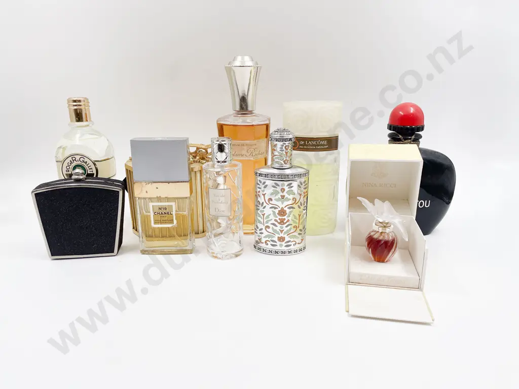 Quantity of Assorted Perfume Bottles Image 1++