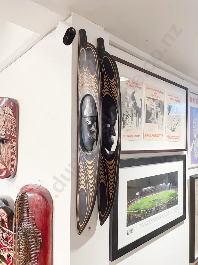 Pair of Tourist Artefact Wall Hangings Image 1++