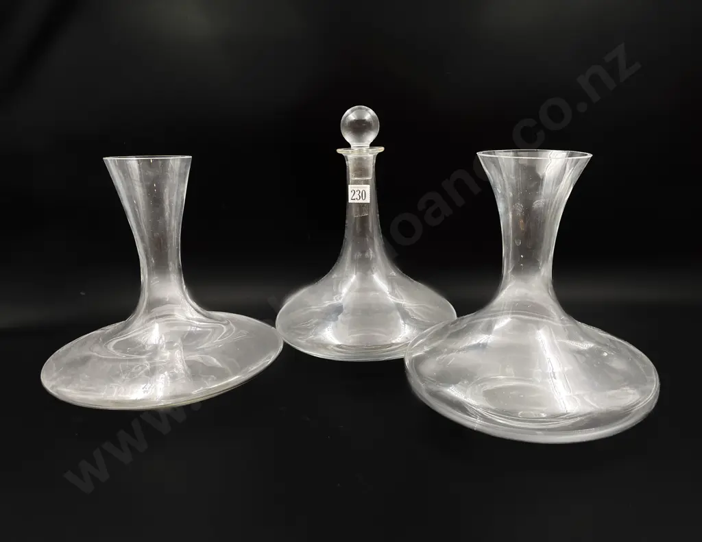 Three Assorted Glass Decanters Image 1++