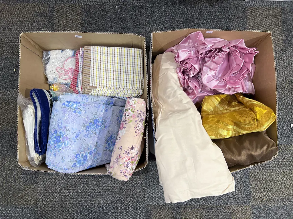 Two Boxes of Assorted Linen together with Bolts of Fabric Image 1++