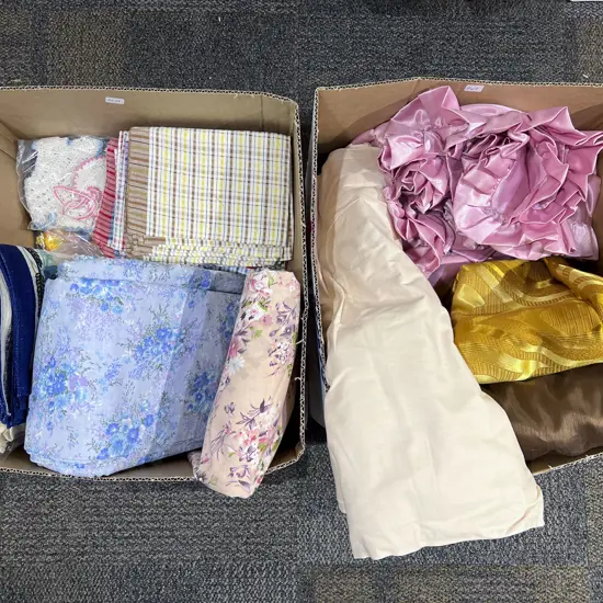 Two Boxes of Assorted Linen together with Bolts of Fabric