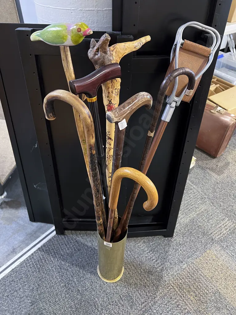 Quantity of Assorted Walking Sticks etc in Brass Shell Casing Image 1++