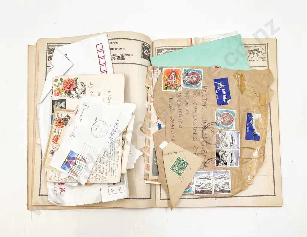 Two Boxes of Assorted Vintage Stamps Image 1++