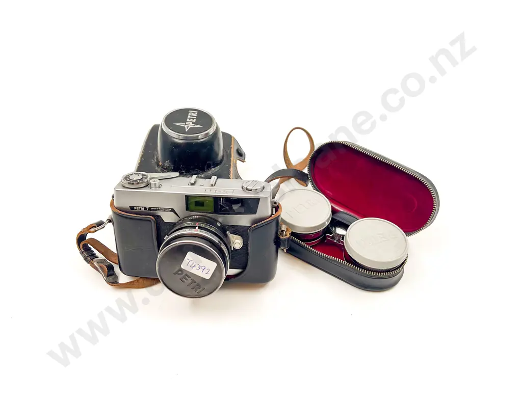 Petri Vintage Camera with Assorted Lenses Image 1++