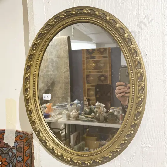 Pair of Oval Gilt Framed Wall Mirrors