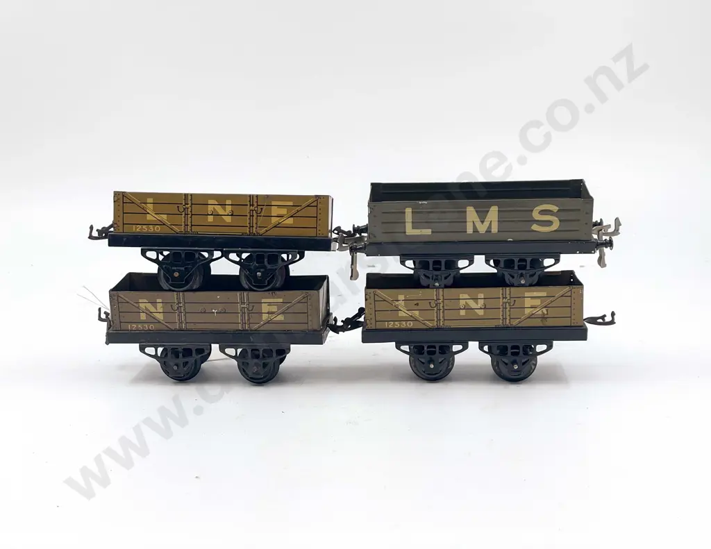 Hornby O Gauge Four Open Wagons on Early Chassis Image 1++