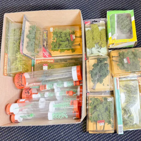 Qty Boxed Assorted Flock and Plastic Trees