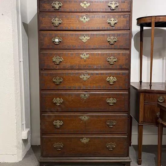 An Attractive Geo III Oak 8 Drawer Tallboy