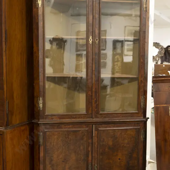 An Attractive C18th Figured Walnut Floor Standing Corner Cupboard
