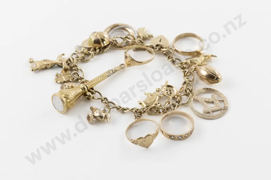 9ct Modern Curb Link Bracelet with Vintage and Antique Charms Image 1++