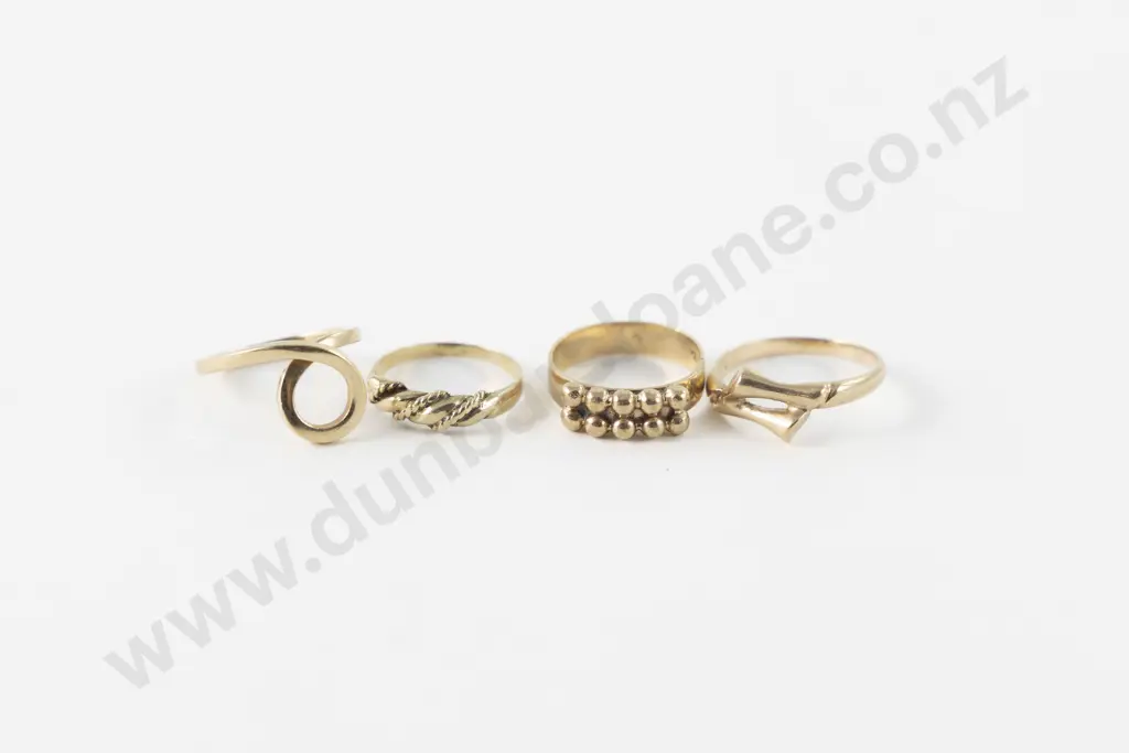 Four 9ct Fancy Rings Image 1++