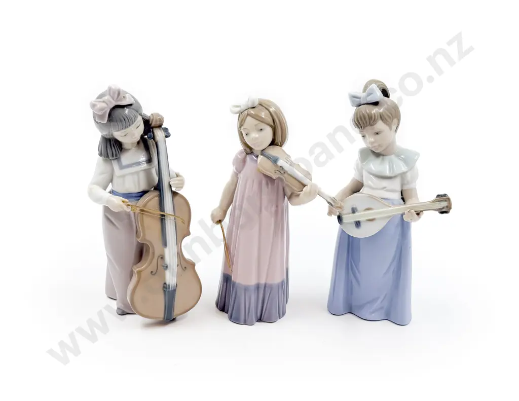 Three Assorted Nao Figures Image 1++
