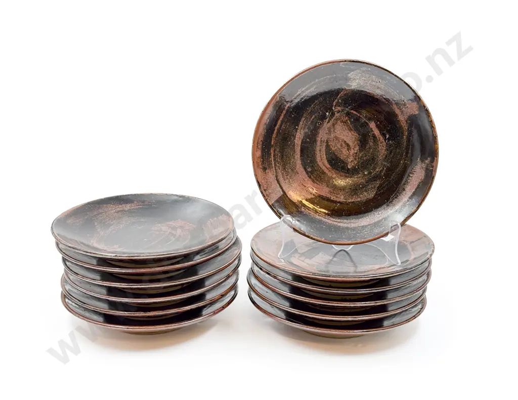 Twelve Assorted Pottery Plates Image 1++