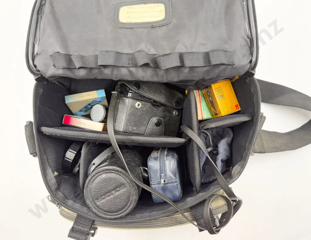 Vintage Olympus Camera with Bag of Assorted Accessories Image 1++