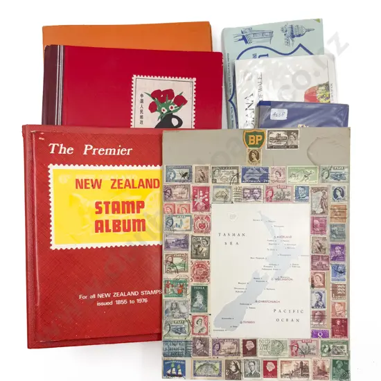 Four Stamp Albums and Assorted Stamps