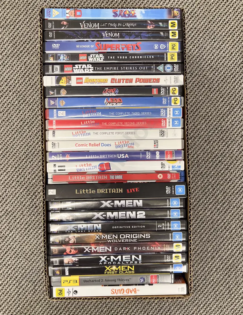 Box Qty of Assorted DVDs Image 1++