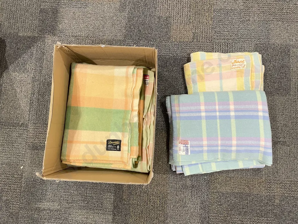 Four NZ Travel Blankets Image 1++